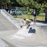 Sequim Gazette photo by Emily Matthiessen / On Saturday at the the Carrie Blake Skatepark, Gunnar Peterson works on a trick. Peterson was one of approximately 200 people who showed up to skate, scooter, bike and support the Sequim Youth Skatepark Foundations fundraiser. The Foundation seeks to rebuild and add on to the skatepark, with a goal of $1,000,000 and $20,000 raised so far.