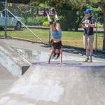 Jes Broder played, competed and did tricks at Sequim Youth Skatepark Foundations Saturday fundraiser at Carrie Blake Skate Park. Broder can roll up a slope and flip herself into a handstand with her skates above her. The skatepark welcomes many different types of wheels, from skateboards to bikes. Sequim Gazette photo by Emily Matthiessen