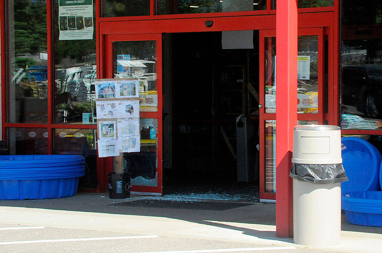 Sequim Gazette photo by Matthew Nash/ Sequim Police continue to investigate a burglary at Coastal. One suspect is in custody while two more men remain at large.