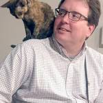 Ryan Malane, pictured with one of his cats, vice president and co-owner of Black Ball Ferry Line, died on June 13. Submitted photo