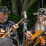 Sequim Gazette photo by Emily Matthiessen / Bill Camuso and Don Betts and the rest of the Old Sidekicks entertain the crowd at the 10th-annual Sequim Valley Lions Crab Feed at Pioneer Memorial Park on June 25.