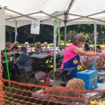 "It's going really well," says Kim Romberg, volunteering at the Sequim Valley Lions 10th annual Crab Feed fundraiser on Saturday. "We're having a good turnout. The weather helped." Sequim Gazette photo by Emily MatthiessenSequim Gazette photo by Emily Matthiessen