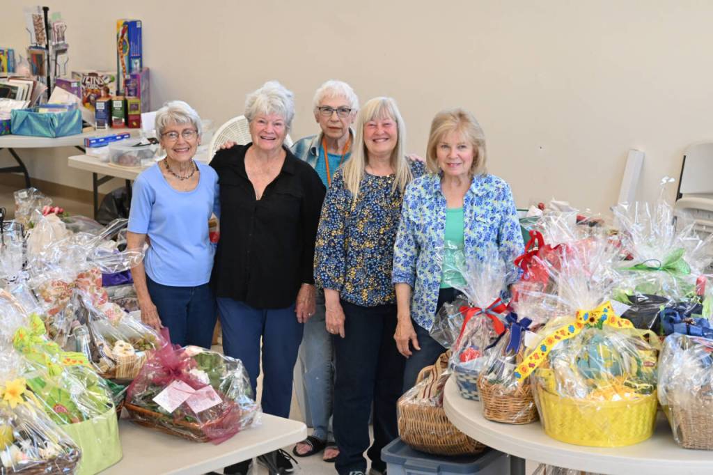 Organizers of the Faith Lutheran Preschool gift basket and tag sale set for Aug. 6 include, from left, Jackie Dawley, Molly Christianson, Jane Thompson, Wendy Merrill and Karen Adams.