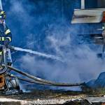 Photo by Jay Cline/Fire District 2 / Firefighters work to help put out a fire at an Agnew property on June 30.