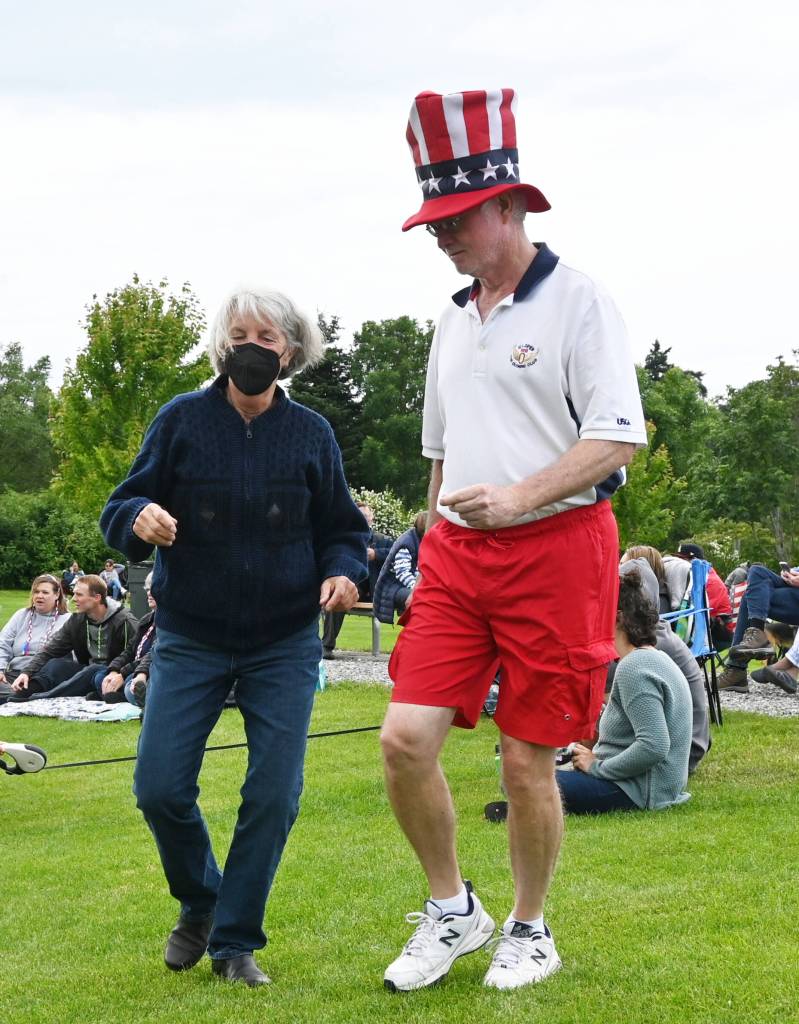Sequim Gazette photo by Michael Dashiell / Nancy Koch of Port Ludlow and Mike VanWinkle of Sequim cut a (grassy) rug at the City of Sequims Independence Day Celebration at the James Center for Performing Arts on July 4.