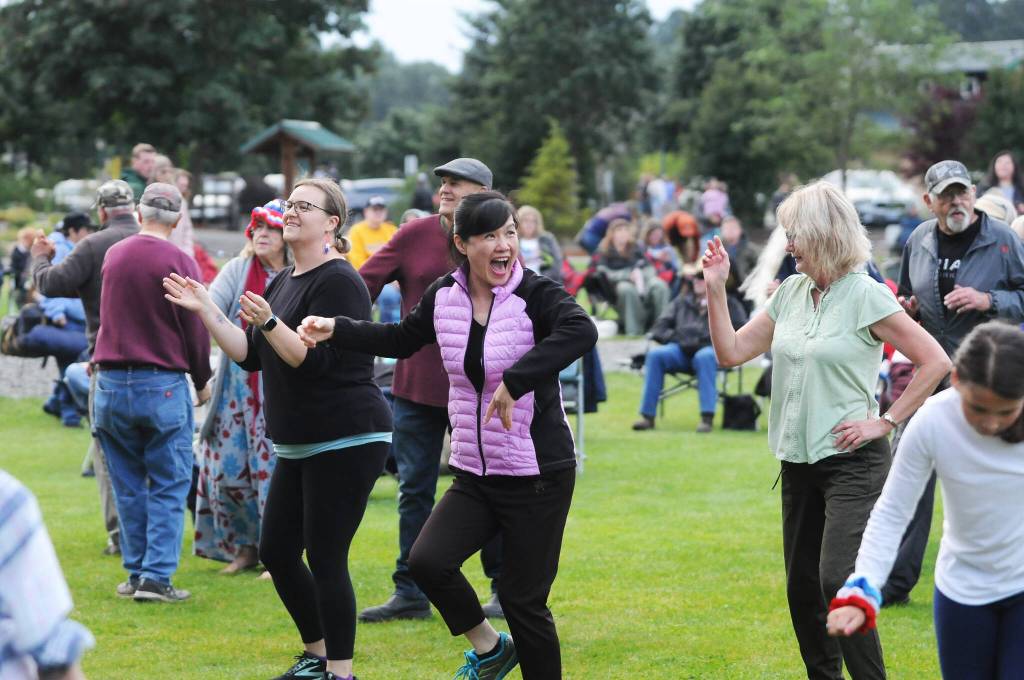 Sequim Gazette photo by Michael Dashiell / The crowd enjoys tunes by Black Diamond Junction at the City of Sequims Independence Day Celebration on July 4.