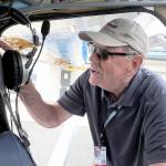 DART volunteer pilot Ray Ballantyne of Sequim prepares his airplane for a training airlift to Diamond Point Airport from Port Angeles on Saturday. (Keith Thorpe/Peninsula Daily News)