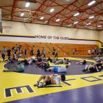 Sequim Gazette photo by Michael Dashiell
Campers on July 14 warm up at the beginning of a camp hosted by former collegiate, national and international wrestling champ Gene Mills.
