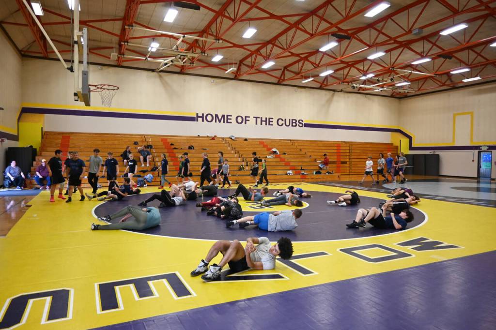 Sequim Gazette photo by Michael Dashiell
Campers on July 14 warm up at the beginning of a camp hosted by former collegiate, national and international wrestling champ Gene Mills.