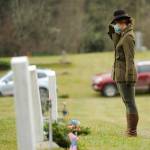Sequim Gazette file photo by Michael Dashiell / Lance Cpl. Holly Rowan, a U.S. Marine Corps veteran, salutes after laying a ceremonial wreath at Wreaths Across America event at Sequim View Cemetery in 2020. Rowan, president of the Clallam County Veterans Association, helps welcome the Wreaths Across America Mobile Education Tour exhibit on Aug. 1.