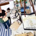 Photo by Emma Jane Garcia/Sequim Farmers & Artisans Market
Tricia Gillespie of Inspired Country Store displays assortment of purses, tote bags, zipper pouches and more at the shops Sequim Farmers & Artisans Market booth.