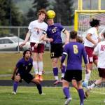 Sequim Gazette file photo by Michael Dashiell
Aidan Henninger, right, pictured vying for a header with a Kingston defender during a game in April, was named 2022 All-Peninsula Boys Soccer Team co-MVP, along with SHS teammate Brandon Wagner.