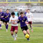 Sequim Gazette file photo by Michael Dashiell
Sequims Brandon Wagner, right, pictured dribbling upfield during a game against Kingston in April, was named 2022 All-Peninsula Boys Soccer Team co-MVP, along with SHS teammate Aidan Henninger.