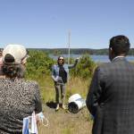 Sequim Gazette photo by Matthew Nash/ Liz Tobin, shellfish program manager for the Jamestown SKlallam Tribe, speaks to a small crowd at Littleneck Beach in Blyn on July 19 about restoration efforts in the area. The U.S. Environmental Protection Agency just announced a $50 million grant over five years to help many treaty tribes, including Jamestown, with salmon and shellfish habitat restoration efforts.