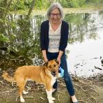 Submitted photo
Rev. Desi Larson, pictured her with Buster, is the new pastor at Trinity United Methodist Church.