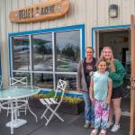 Sequim Gazette photo by Emily Matthiessen
Heather, Olivia and Samantha Owen stand outside Belles Black Pot at 131 River Road in Sequim. The beach-themed coffeehouse and deli specializes in old favorites and new flavor combinations, both in drinks and food.