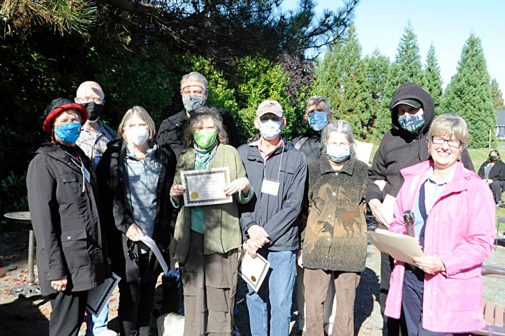 Olympic Unitarian Universalist Fellowships Little Free Pantry Committee, features, from front left, Florence Bucierka, Peggy Toppenberg, Dianne Whitaker, Michael Bucierka, Susan Harris, Vicki Sensiba; back left, Greg Sensiba, John Toppenberg, Dave Large, Ren Garypie. Sequim Gazette photo by Matthew Nash