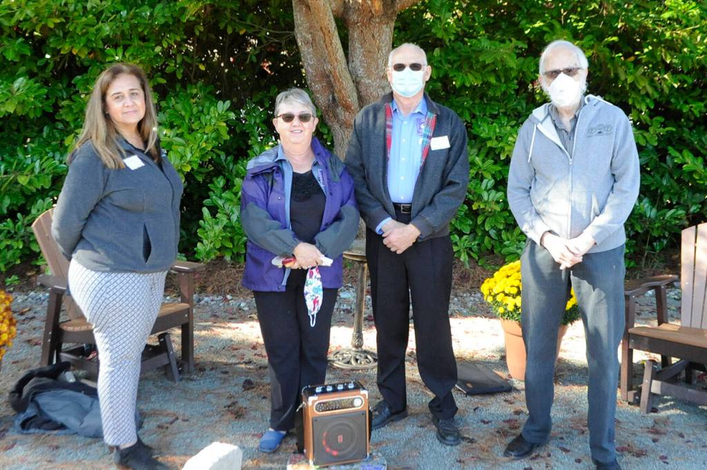 Some of the financial donors for the Little Free Pantry included reps from various agencies, including, from left, Sara Irish with the MolinaCares Foundation; Philomena and Ted Lund with the Kiwanis of Sequim-Dungeness, and Bob Dunlap with Project Homeless Outreach. Sequim Gazette photo by Matthew Nash