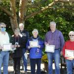 Volunteer who worked on the construction of the Little Free Pantry, included, from left, Ken Nielsen, Jolie and George Will, Penny Burdick, Phil Zenner, and Jack Webber. Sequim Gazette photo by Matthew Nash