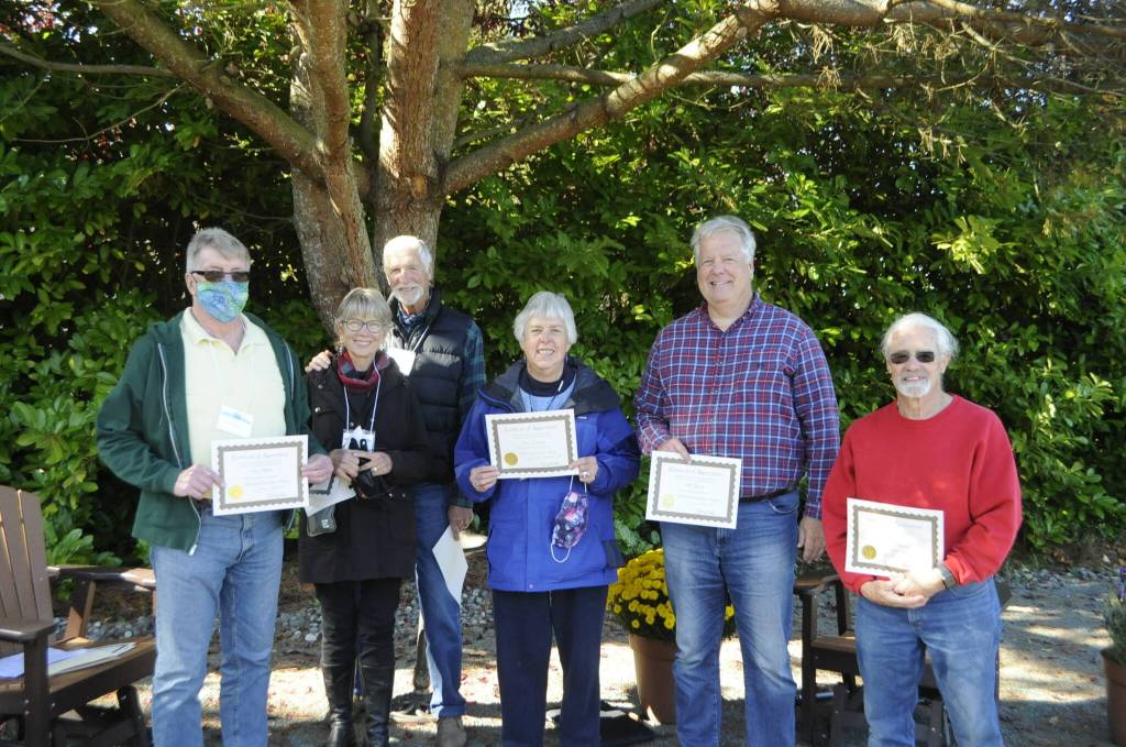 Volunteer who worked on the construction of the Little Free Pantry, included, from left, Ken Nielsen, Jolie and George Will, Penny Burdick, Phil Zenner, and Jack Webber. Sequim Gazette photo by Matthew Nash
