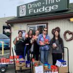 Submitted photo
WeDo Fudge and Clallam County Public Utility District team up in 2019 to donate 342 pound of peanut butter and $751 to the Sequim Food Bank.