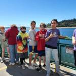 Submitted photo
Boys & Girls Club members, from left, Bee Mao, Paisley Taylor, Hunter Carleson, Daniel Salanoa, Russell Thomas, Alex Salanoa, and JD Kessler, enjoy a ferry ride on the way to a Seattle Storm basketball game.