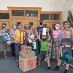 Photo courtesy of Dungeness Valley Lutheran Church
Volunteers compile kits with housewares at Dungeness Valley Lutheran Church on July 26 for Ukrainian refugees now in Washington.