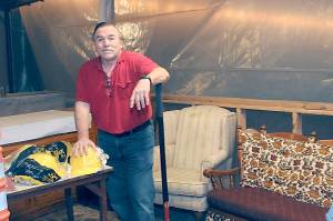 Photo by Keith Thorpe/Peninsula Daily News Group / Ron Graham, president of Ghostlight Productions, stands in the former lobby of the Lincoln Theater on July 29 in downtown Port Angeles.