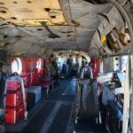 Sequim Gazette photo by Michael Dashiell / Attendees of the 2022 Unity of Effort event, held Aug. 6 at Security Services Northwest, get an inside look at a special forces Chinook helicopter.