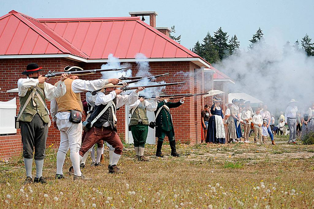 Sequim Gazette file photo by Matthew Nash
Colonial soldiers shoot at the British in a skirmish during the Northwest Colonial Festival last year. It returns for four days Aug. 11-14 with skirmishes, demonstrations and more at the George Washington Inn.