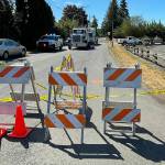 Sequim Gazette photo by Matthew Nash/ Access from River Road to West Silberhorn Road was closed for several hours on Aug. 8 after a cyclist died after being struck by a garbage truck.