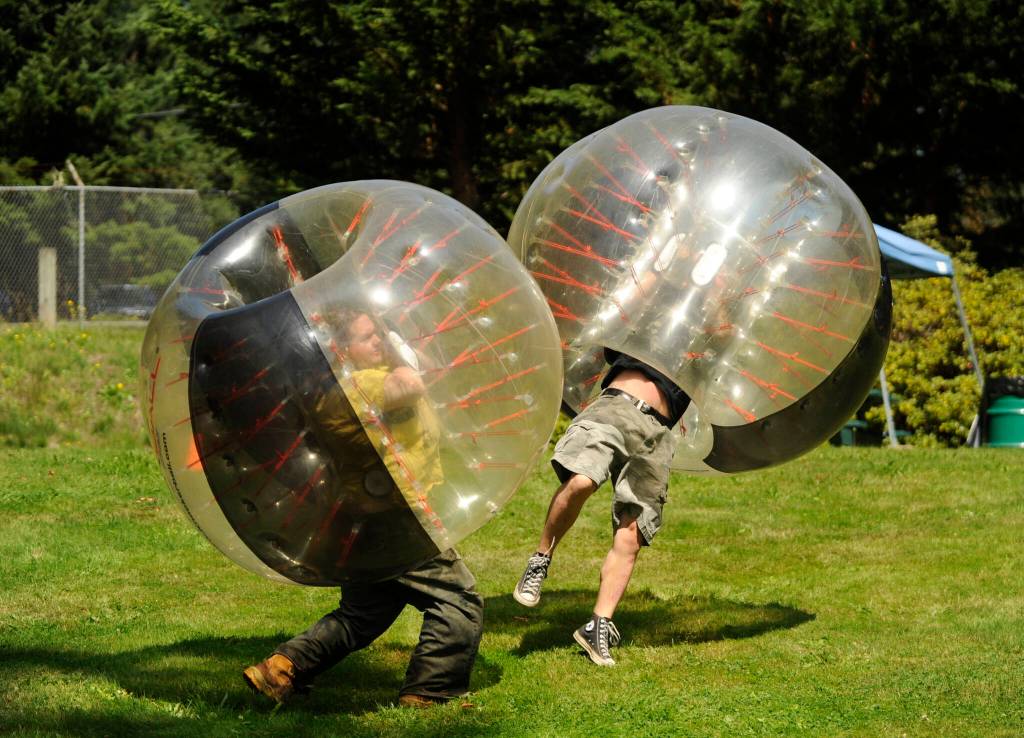 Sequim Gazette file photo by Michael Dashiell
Brothers Gary Brock, left, and Johnny Callisesi of Port Angeles play a friendly game of bubble ball at the Clallam County Fair in 2019.