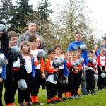 Sequim Gazette file photo by Matthew Nash
Players and coaches celebrate the opening of the Sequim Little League season in 2019.
