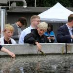 Sequim Gazette photo by Matthew Nash/
Jennifer Granholm, U.S. Secretary of Energy, holds eelgrass, a native seagrass species important for nearshore ecosystems, on Aug. 10 at PNNL-Sequim after she toured Sequim Bay via boat.