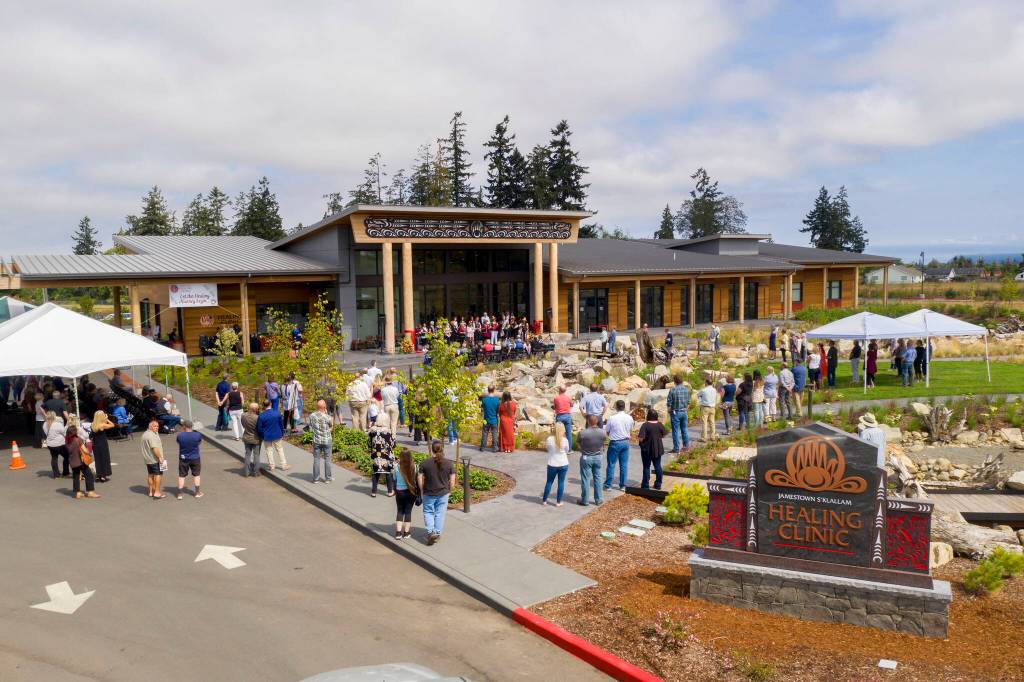 Photo by John Gussman 
Tribal members, staff and advocates celebrate the Jamestown Healing Clinics grand opening ceremony on Aug. 20.