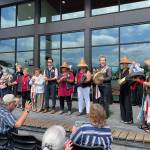 Sequim Gazette photo by Matthew Nash/ For the Jamestown Healing Clinics grand opening on Aug. 20, tribal citizens and descendants performed two songs, The Happy Song and We sing strong used with permission from the Port Gamble SKlallam Tribe and Joseph Price.