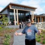Tim Wheeler gives thumbs up while wearing the Jamestown Healing Clinics first T-shirt after a grand opening ceremony on Aug. 20. Wheeler, a Sequim High graduate and with the group Voices for Health & Healing, said this is one of the best recognitions of his life. Brent Simcosky, the tribes health services director, said Wheeler was a big supporter of the tribe and the clinic, and the first in line at a forum they held to speak in support.