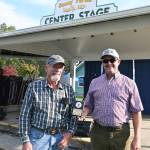 Sequim Gazette photos by Michael Dashiell
Jeff Schmidt, right, and Kerry Lux display the 2022 Farm Family of the Year award bestowed to Schmidts late father, Roger, at the Clallam County Fair on Aug. 18. Roger Schmidt, a longtime farmer, grocer, family man and yo-yo champion, founded Sunny Farms Country Store. Lux has farmed for the Schmidt family for more than 33 years.