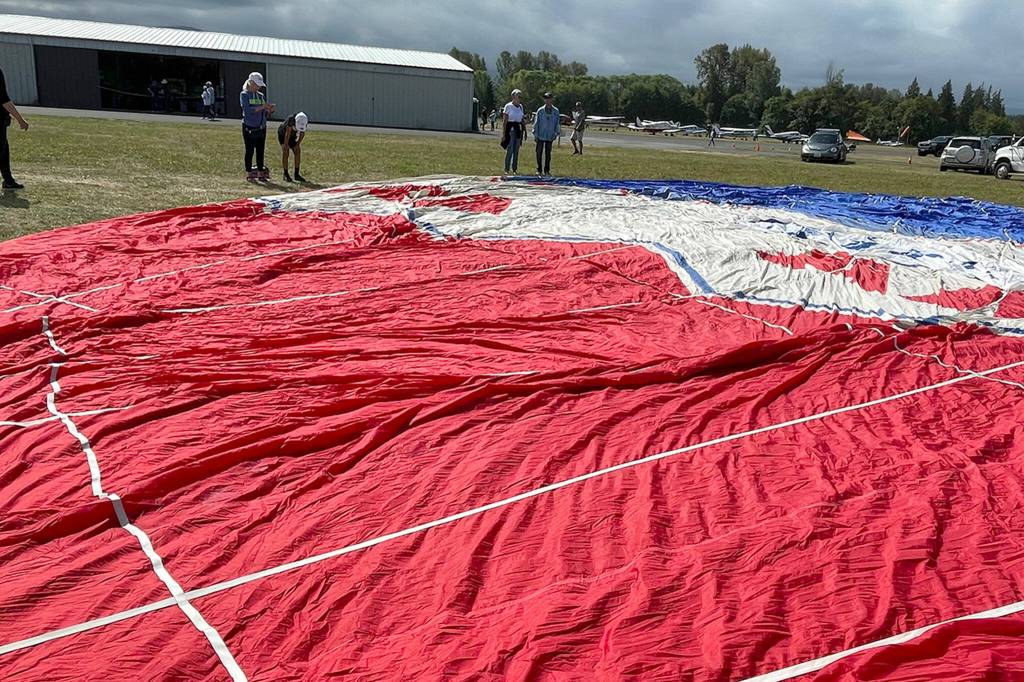 Sequim Gazette photo by Matthew Nash/ Winds prevented a hot air balloon from being blown up for people to go into and throw beach balls at the Olympic Peninsula Air Affaire & Sequim Valley Fly-In on Aug. 27 at the Sequim Valley Airport.