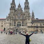 Photo courtesy of Danni Breen / Danni Breen of Sequim rejoices in completing her Camino de Santiago adventure this summer in front of the Santiago de Compostela Cathedral.