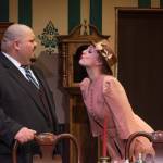 Sequim Gazette photo by Emily Matthiessen / Merrin Packer as Elaine Parker leans in for a kiss from self-absorbed Mortimer Brewster, played by Mario Arruda in OTAs upcoming Arsenic and Old Lace.