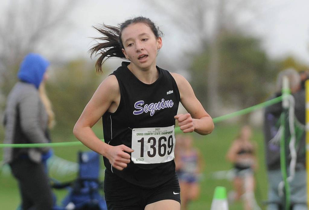 Sequims Kaitlin Bloomenrader, then a sophomore, races at the 2A state cross country championship meet in Pasco in November 2021. In her first state meet, Bloomenrader placed 20th.