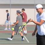 Espn Judd warms up with teammates at a preseason practice last week. Judd, Garrett Little and William Hughes are the Wolves returning varsity players this fall.