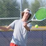 Sequim Gazette photos by Michael Dashiell
Garrett Little warms up with teammates at a preseason practice last week. The junior placed third in singles at the class 2A state tournament in 2021.