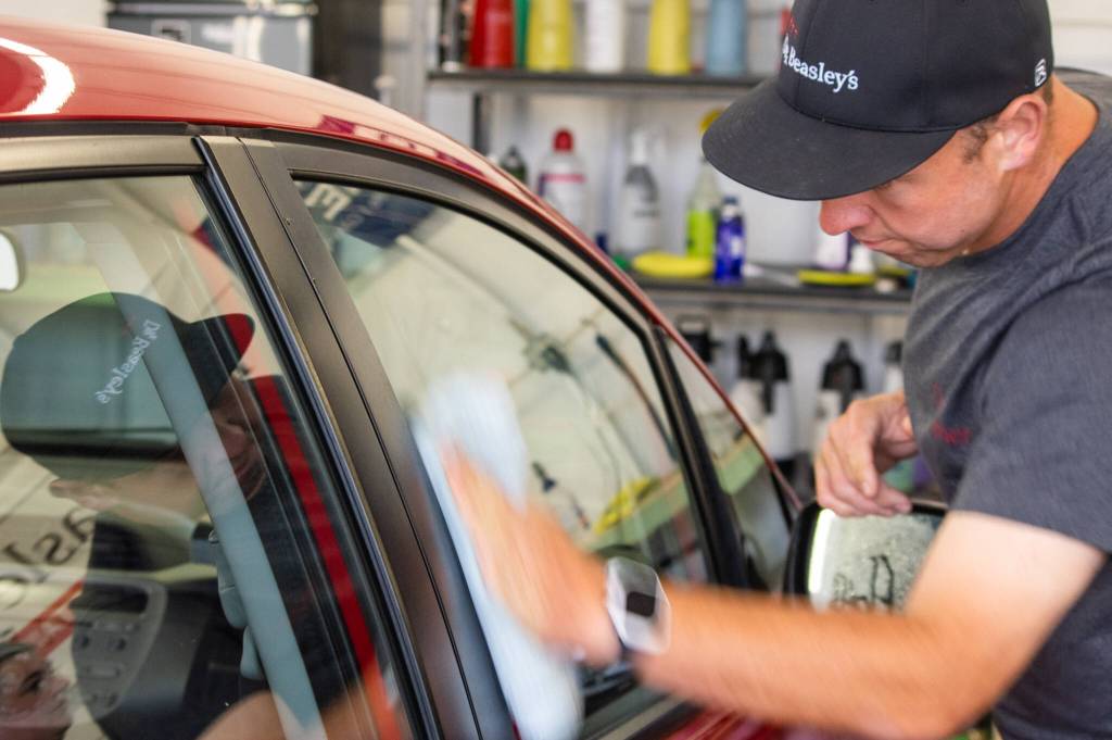 Sequim Gazette photo by Emily Matthiessen / Christopher Burris of Exquisite Reflection Details  formerly Auto Detail by Burris  opened his new shop on 154 E. Washington St. in August after four years of building a loyal client base at other locations.