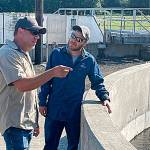 Photo courtesy of the City of Sequim/ Josh Rees and Timmy Wright recently discuss operations at the City of Sequims Water Reclamation Facility. In a proposed 2022 water preliminary plan, city staff look to use more of the water for aquifer recharge projects, augmentation of Bell Creek, and more.