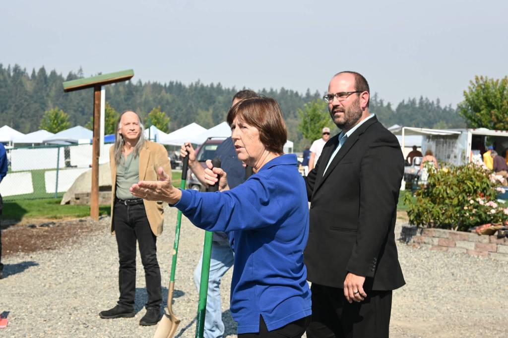 Sequim Gazette photo by Michael Dashiell
Sequim City Band president Debbi Soderstrom lauds efforts by band members to raise funds for the Rehearsal Hall expansion project during a groundbreaking ceremony on Sept. 10.