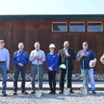 Sequim Gazette photo by Michael Dashiell / From left: Sequim City Band secretary Steve Shepherd and city band treasurer Dave Proebstel, State Rep. Steve Tharinger, Sequim City Band president Debbi Soderstrom, band director Tyler Benedict, Neely Construction superintendent Eli Collier and architect Roy Helwig of Tormod Hellwig LLC.
