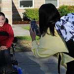 Floyd Vuckel-Macrae smiles for his sister Ashley Macrae before his first day as a seventh grader at Sequim Middle School on Sept. 7.