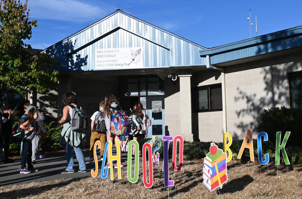 Sequim Gazette photo by Michael Dashiell / Students wait outside Greywolf Elementary School on the first day of school on Sept. 7.